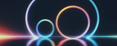 Abstract Neon Rings Glowing On Reflective Dark Surface