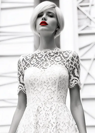 Fashion Portrait of a Woman in a White Lace Dress