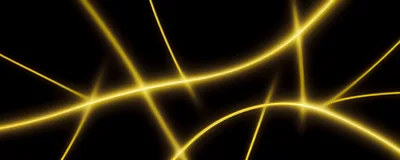 Abstract Glowing Golden Light Streaks On Black Background