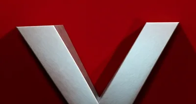 Metallic Letter V Symbol On Red Background