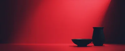 Minimalist Black Ceramic Bowl and Vase on Red Background
