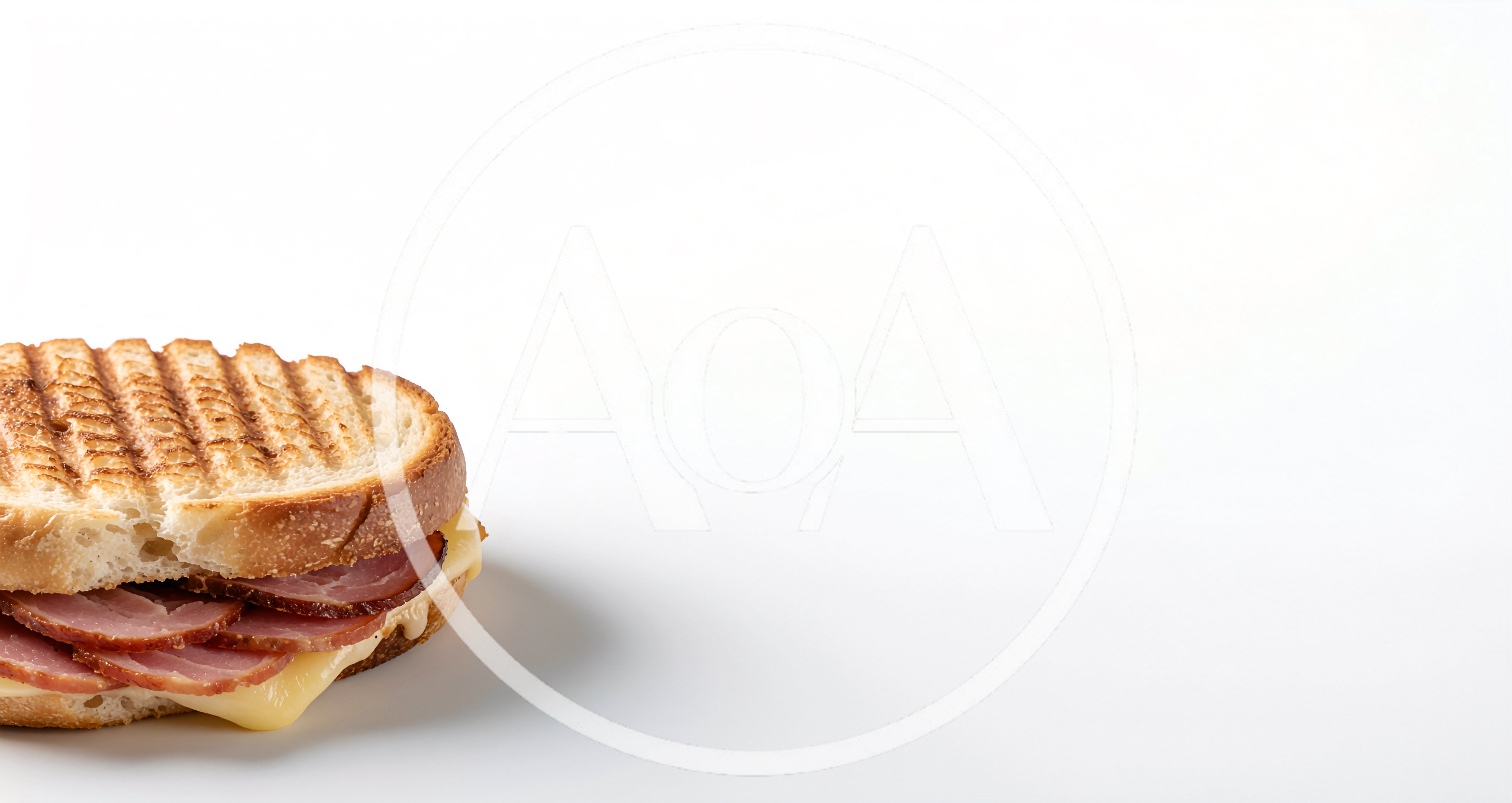 Grilled Ham and Cheese Sandwich on White Background