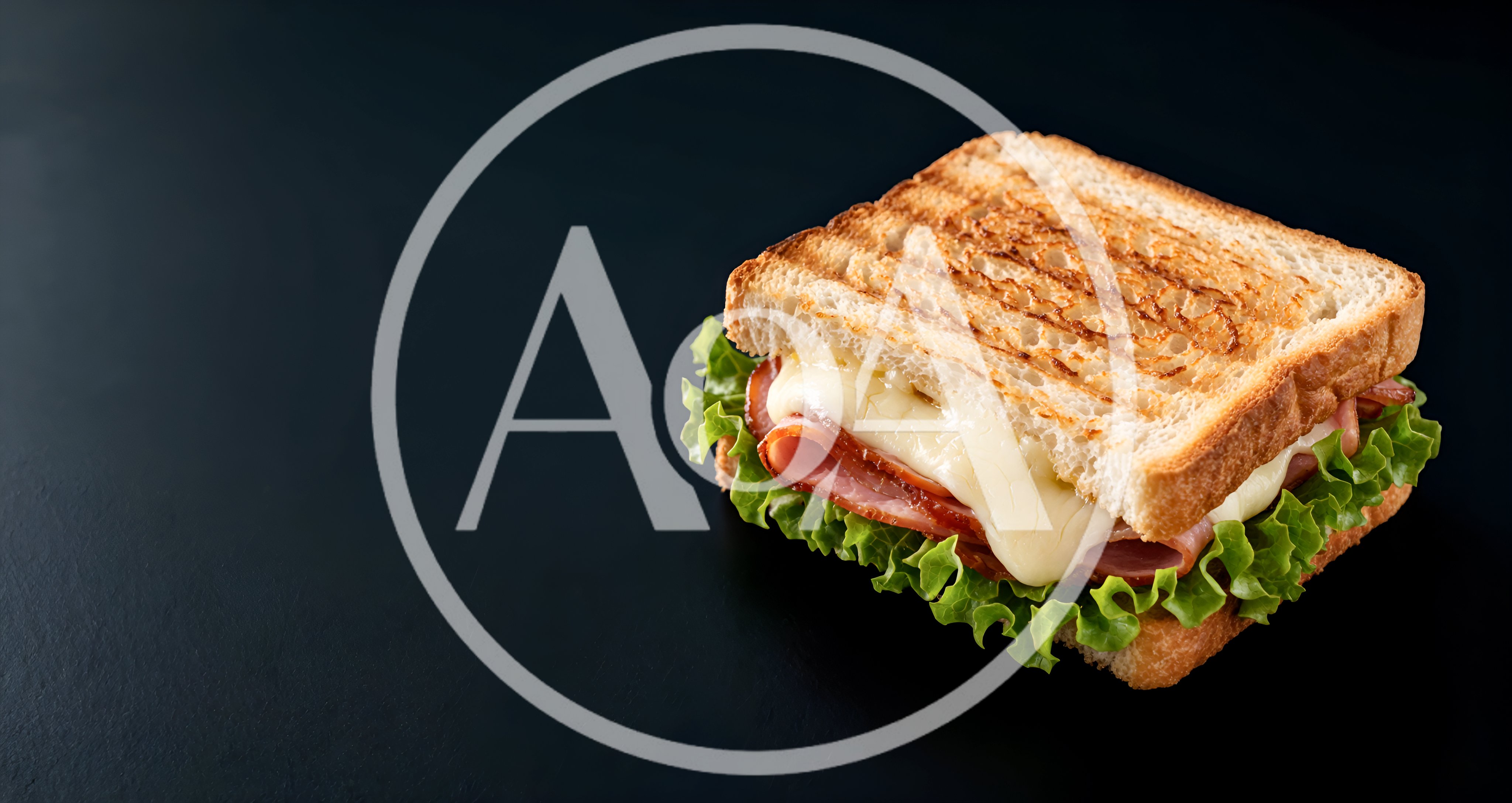 Toasted Ham and Cheese Sandwich on Black Background