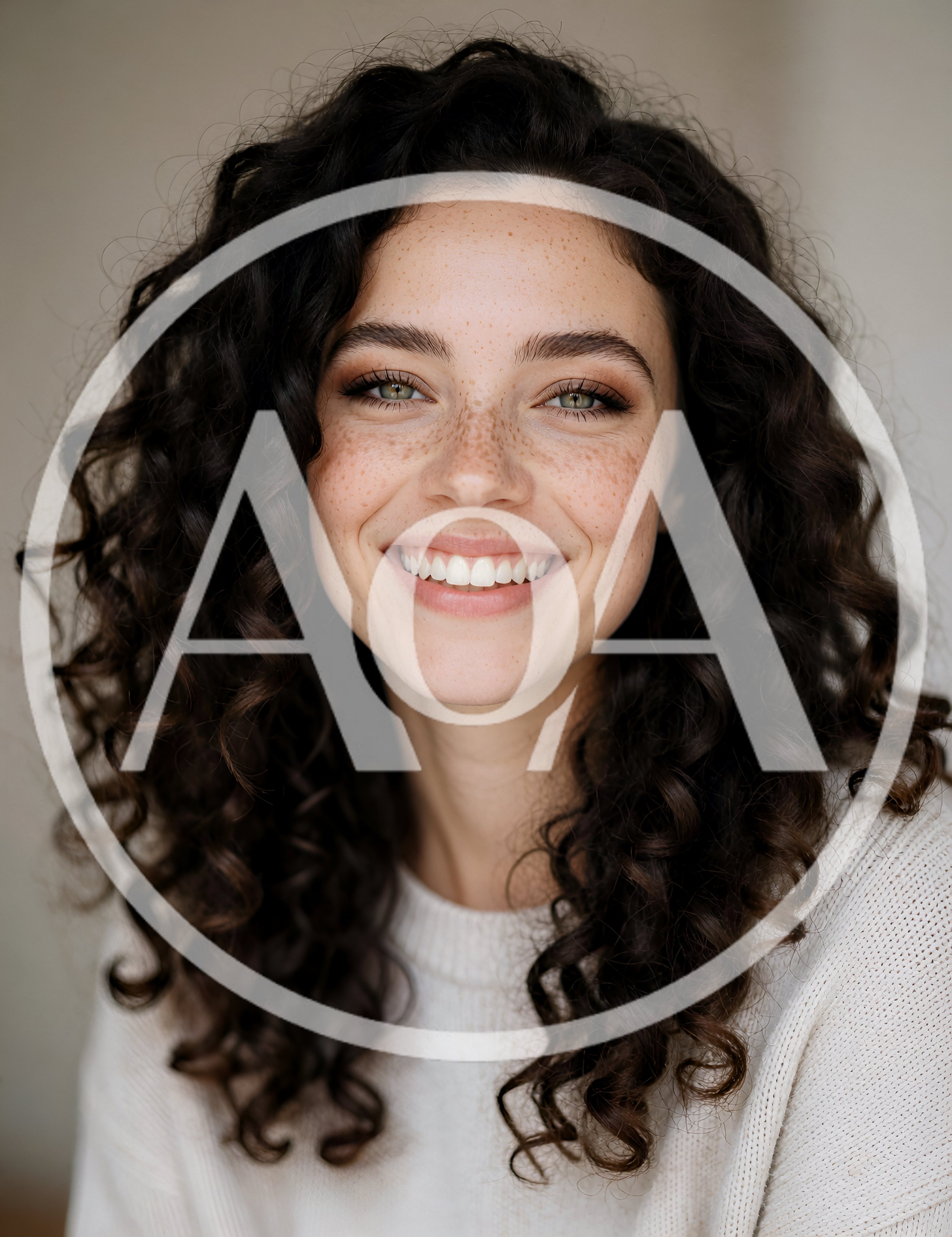 Portrait Of A Smiling Woman With Curly Hair