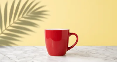 Red Coffee Mug on Marble Surface