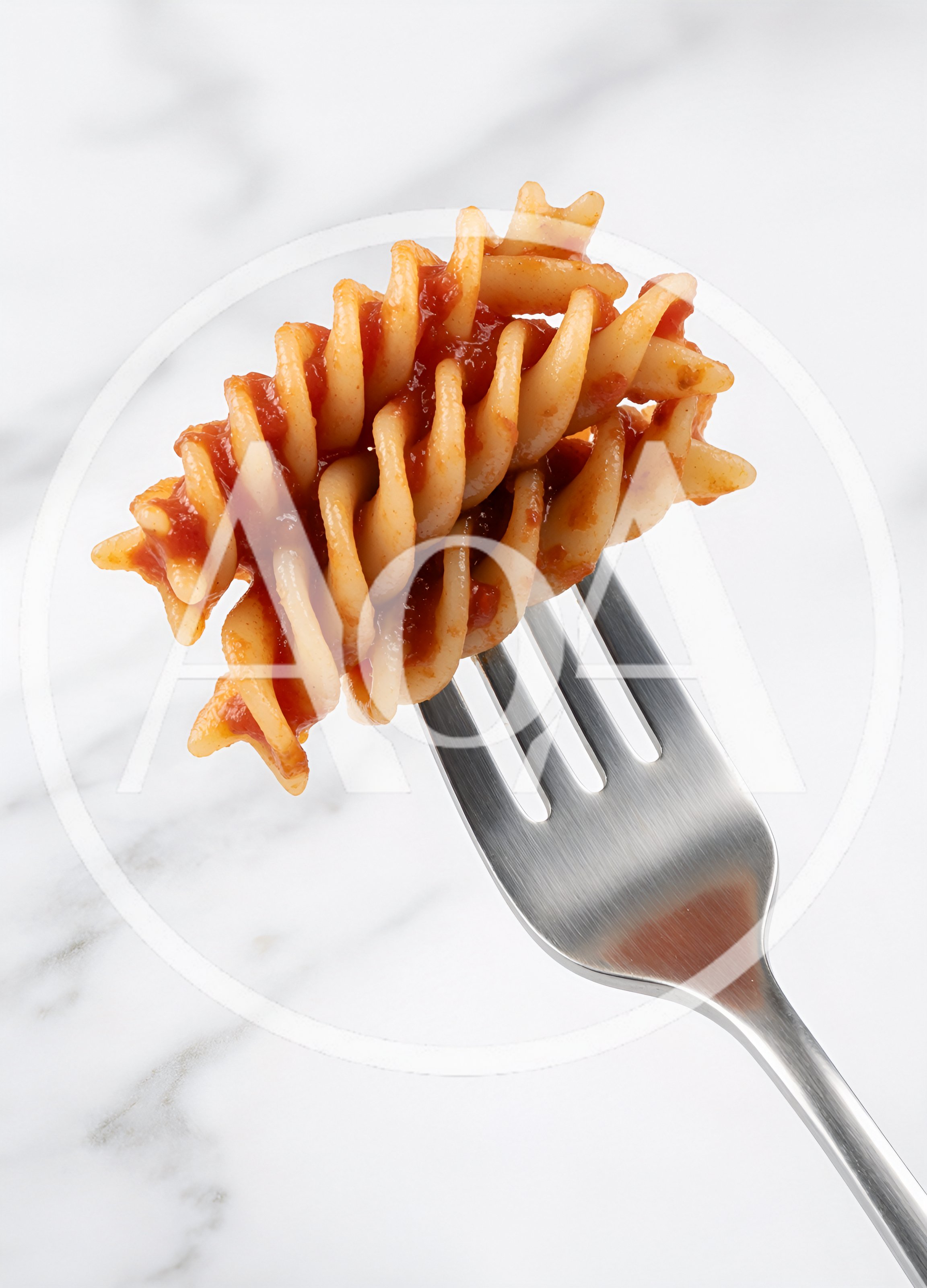 Fusilli Pasta With Tomato Sauce On A Fork