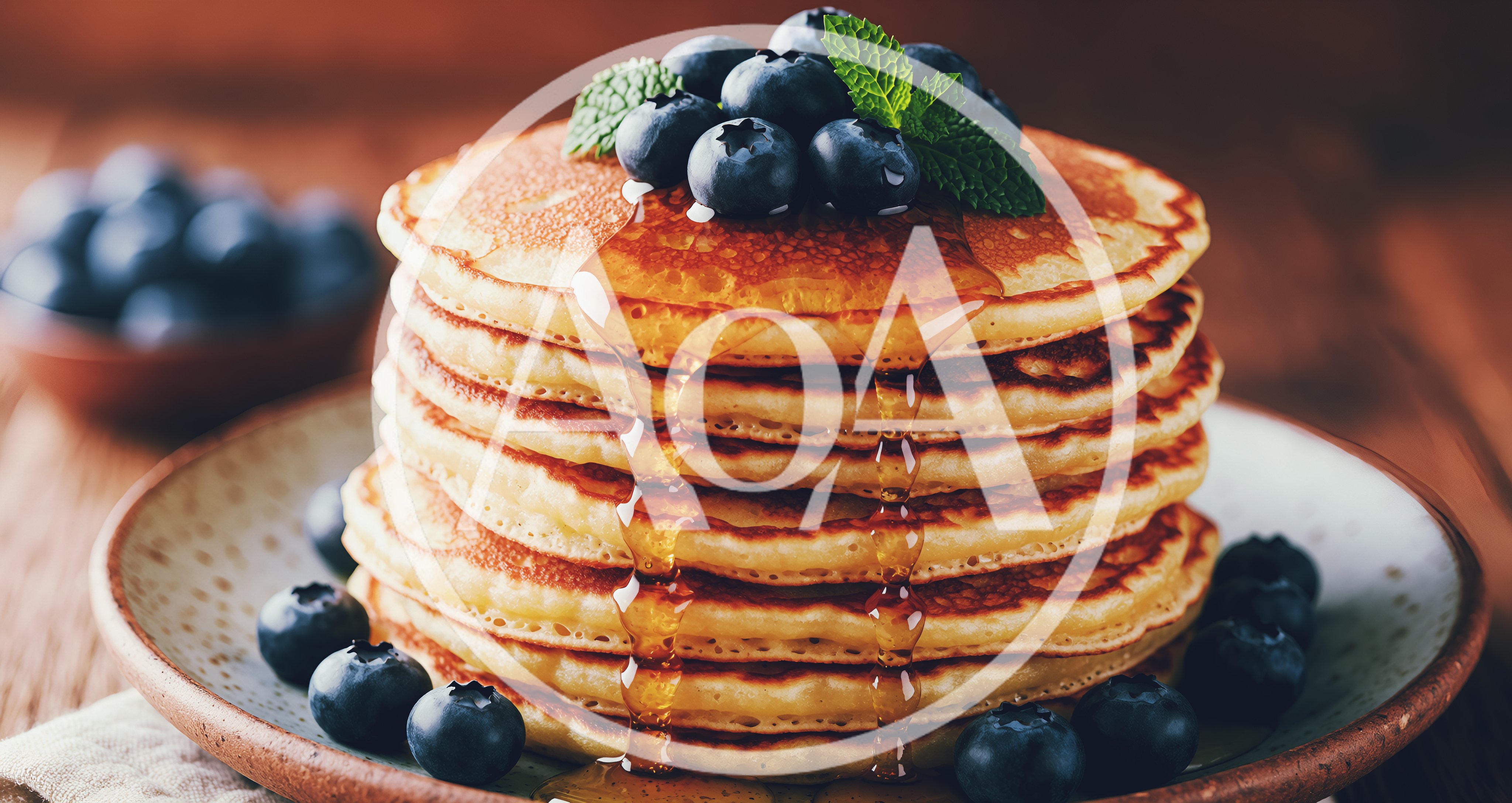 Stack of Fluffy Pancakes with Blueberries and Syrup