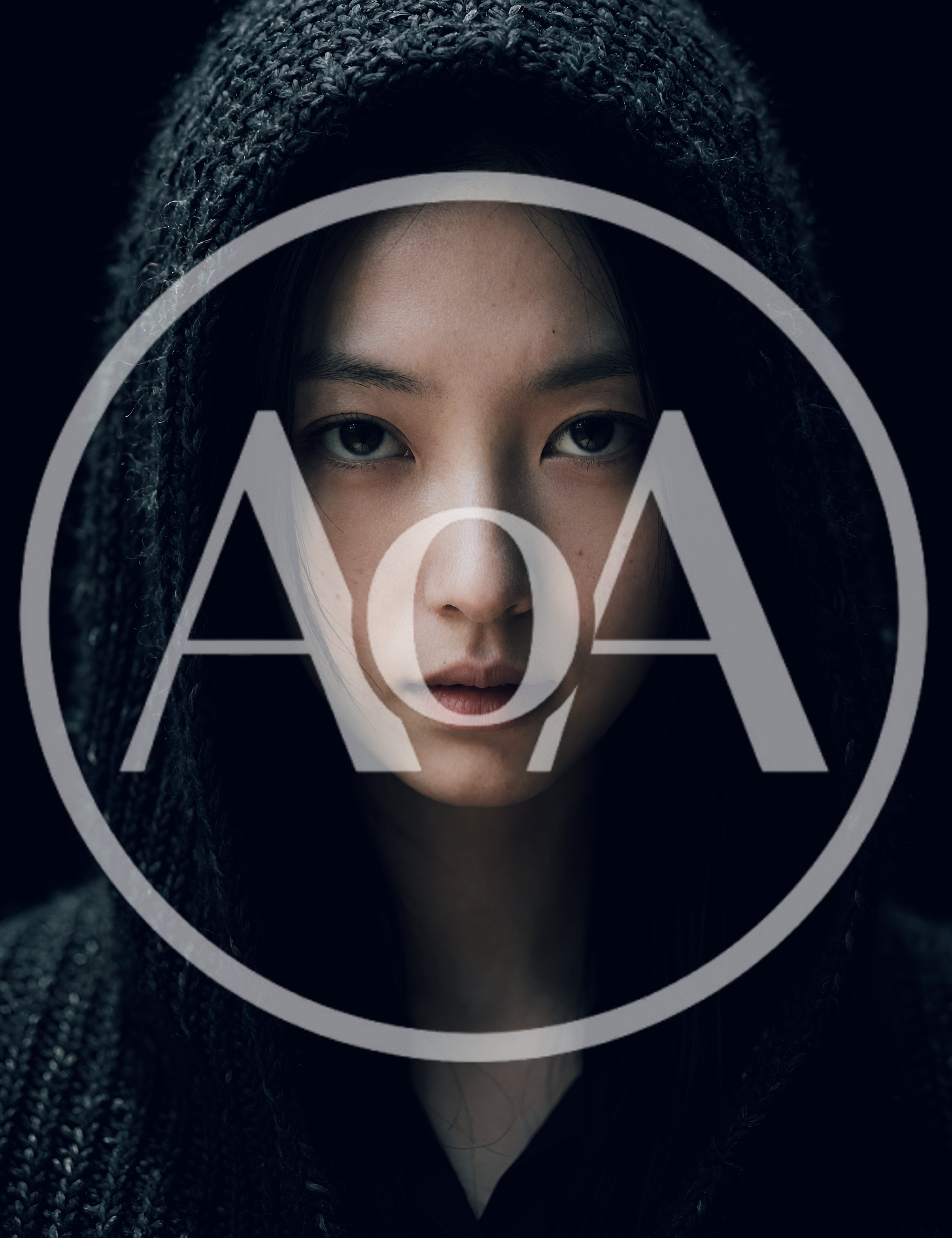 Portrait Of A Young Woman In A Dark Hood