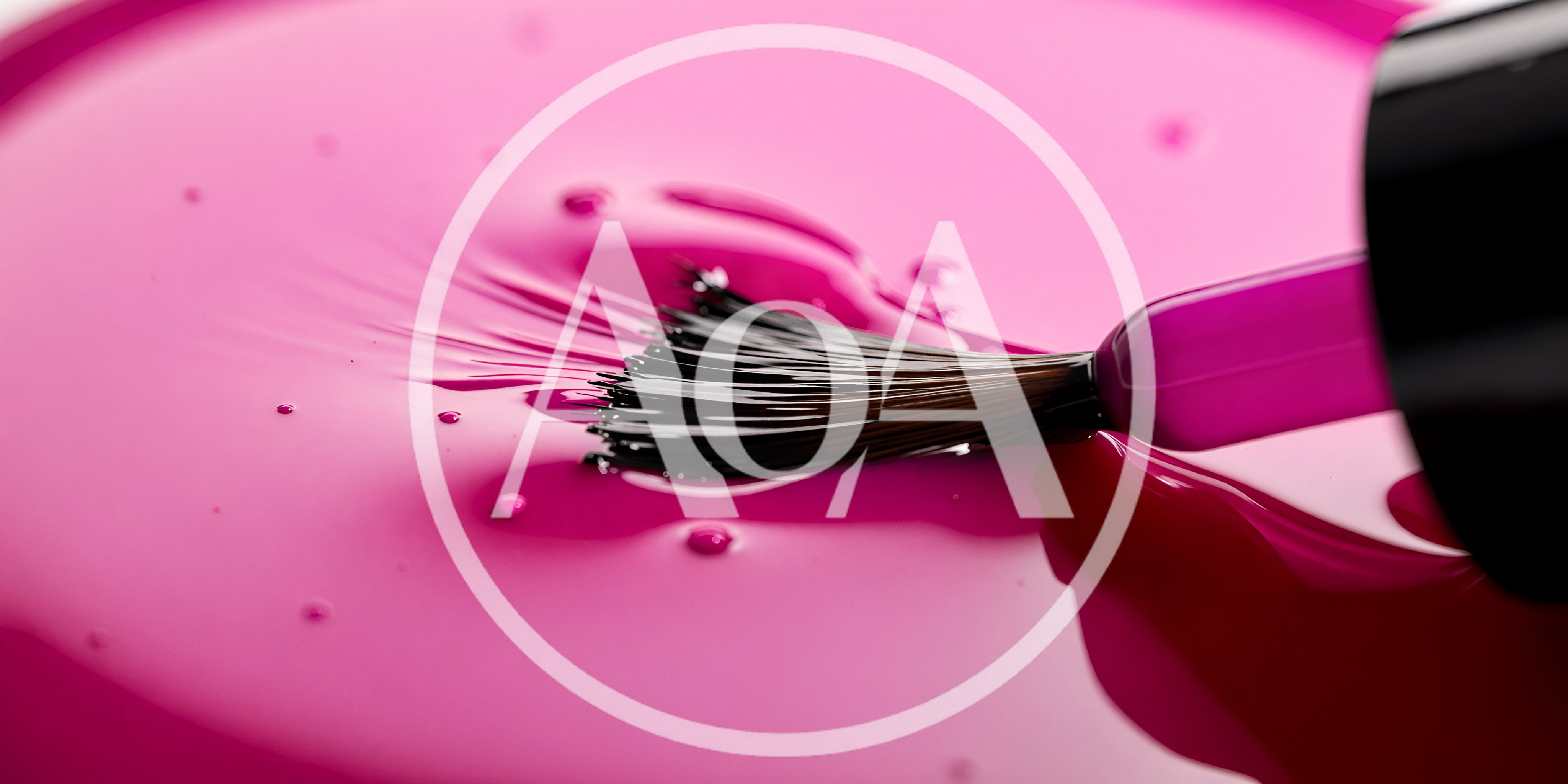 Nail Polish Brush Dipped In Vibrant Pink Liquid