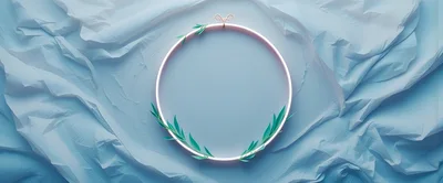 Minimalist Circular Frame With Green Leaves On Blue Fabric