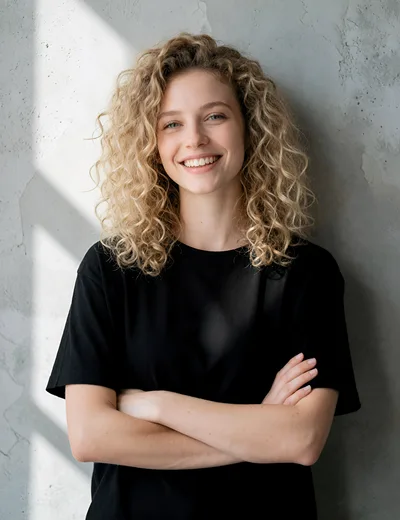 Smiling Young Woman With Curly Blonde Hair