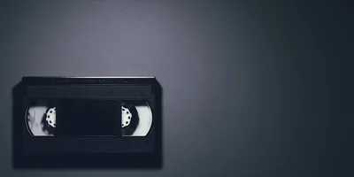 Vintage VHS Videocassette Tape On Dark Background
