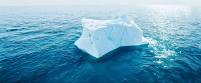 Large Iceberg Floating In The Open Ocean