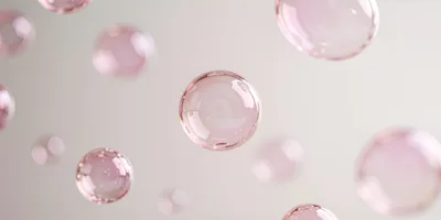 Floating Pink Translucent Spheres On Soft Background
