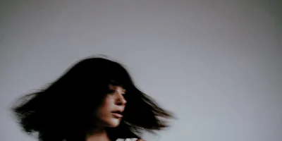 Young Woman With Motion Blur Hair Movement