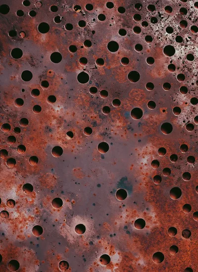 Rusty Metal Sheet With Perforated Circular Holes