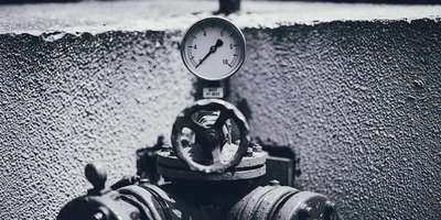 Industrial Pressure Gauge Mounted On A Metal Valve