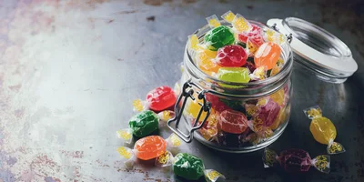Glass Jar Filled With Colorful Hard Candies