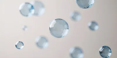 Floating Transparent Water Spheres On Neutral Background