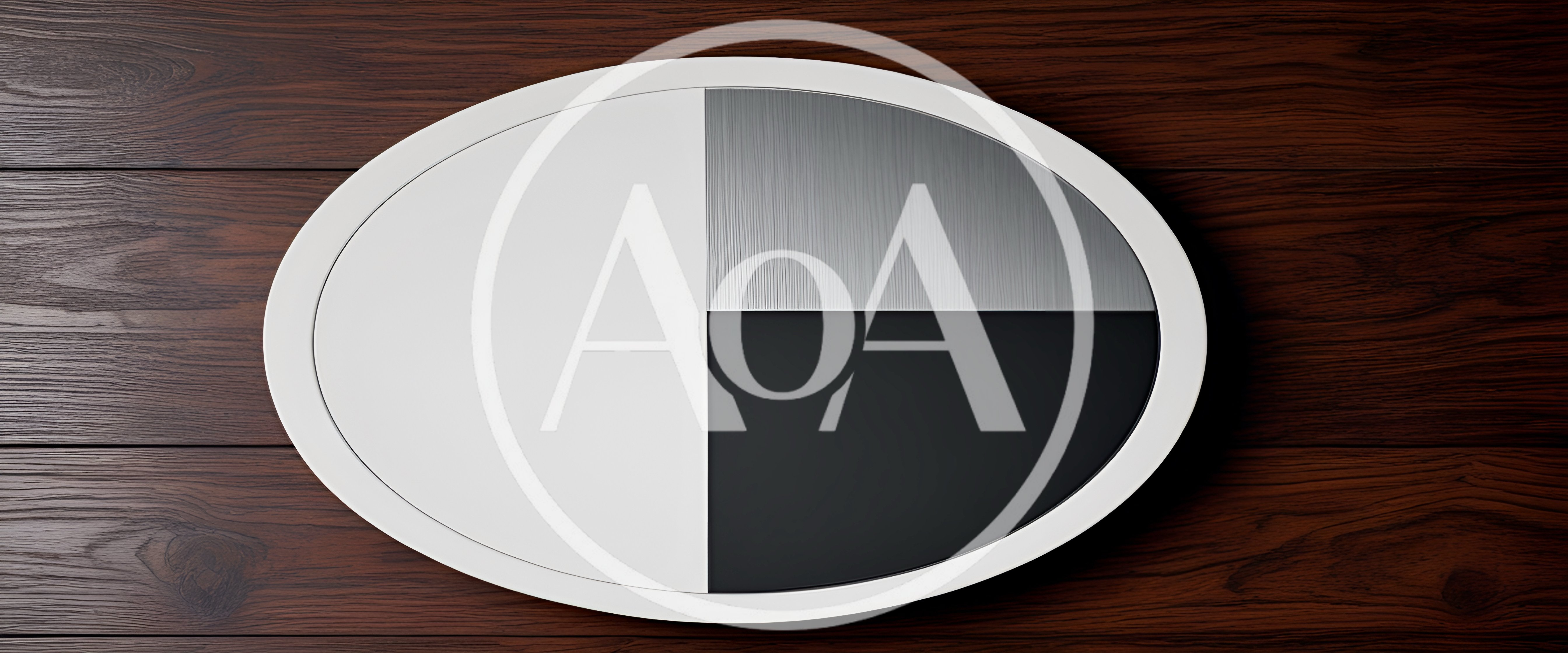 Minimalist Oval Design Object On Dark Wood Surface