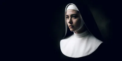 Portrait Of A Young Nun In Traditional Habit
