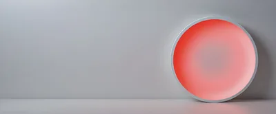 Minimalist Circular Light Fixture On Grey Wall