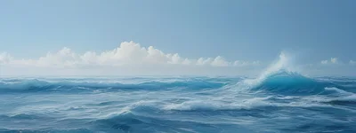 Ocean Waves Crashing Under A Clear Blue Sky