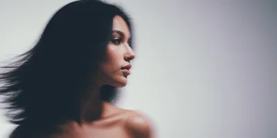 Portrait Of A Beautiful Woman With Flowing Hair