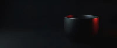 Minimalist Black Cup With Red Ambient Lighting