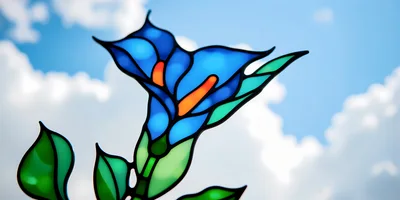 Stained Glass Blue Flower Against A Cloudy Sky