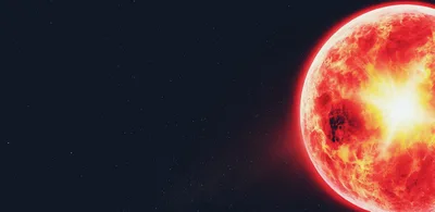 Glowing Red Planet In Deep Space