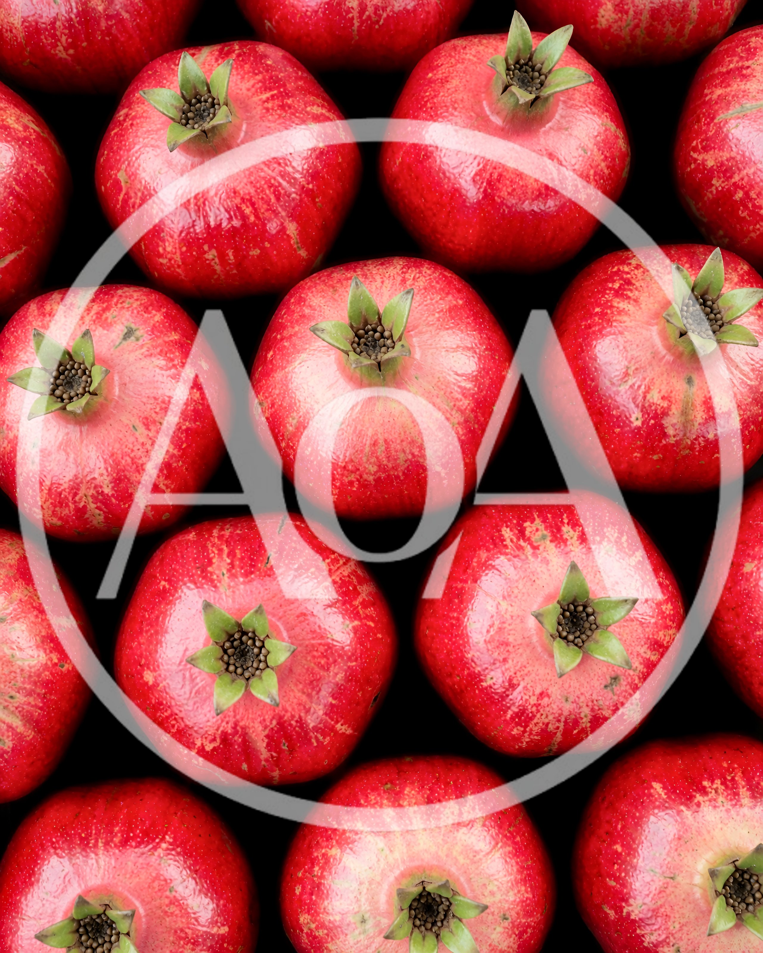 Fresh Ripe Pomegranates Arranged In A Pattern
