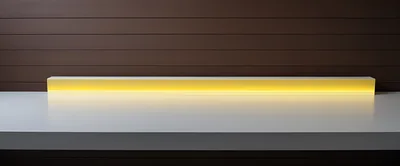 Minimalist White Countertop With Glowing Yellow LED Strip