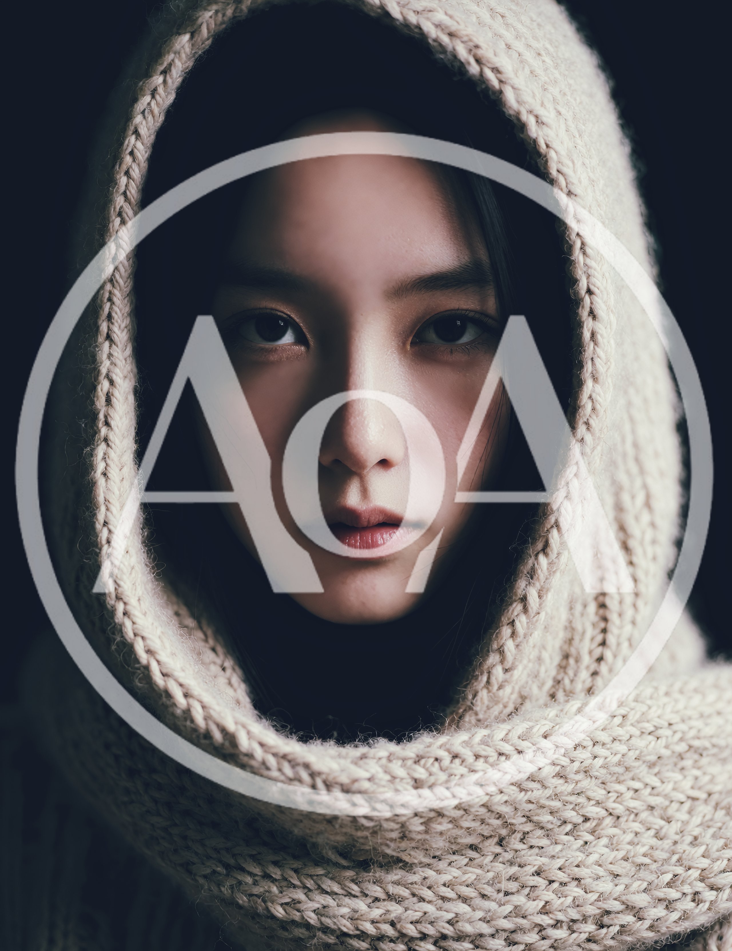 Portrait Of A Young Woman Wearing A Knitted Hood