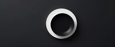 Top View Of A Black Bowl On A White Plate