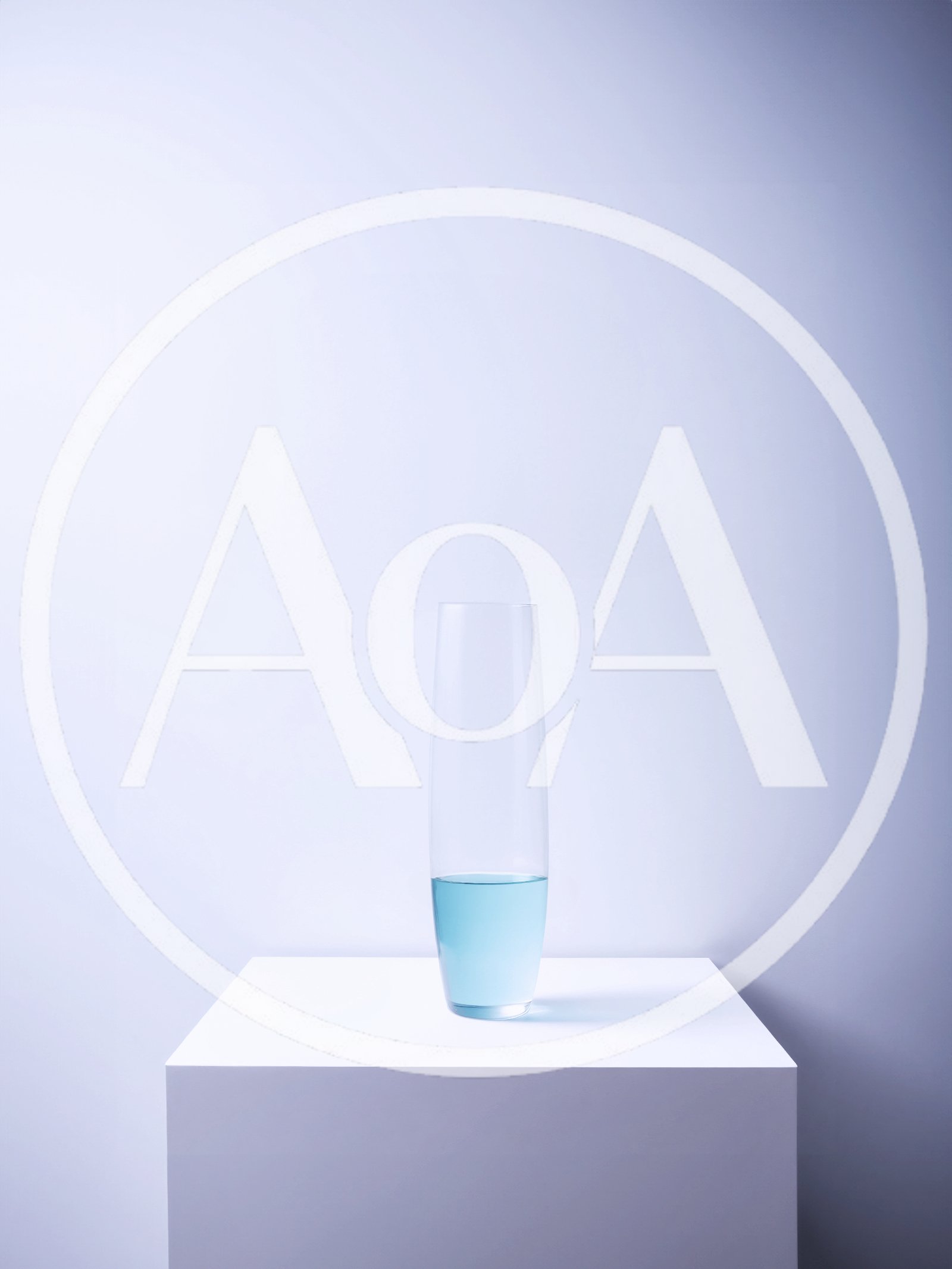 Clear Glass Vase With Blue Liquid On White Pedestal