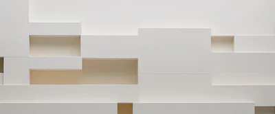 Modern Abstract White Wall With Recessed Geometric Shelving