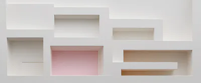 Abstract White Geometric Wall Shelving With Pink Accent