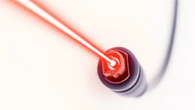 Red Laser Beam Emitting From A Fiber Optic Connector
