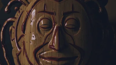 Close Up Of A Wooden Carved Mask