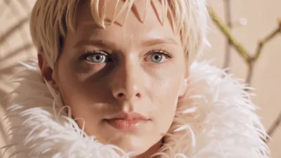 Close Up Portrait Of A Blonde Woman With Short Hair