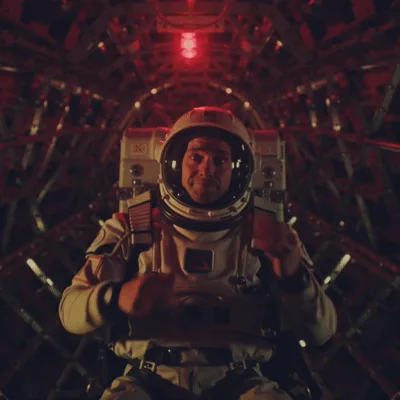 Astronaut In Panic Inside Red Lit Spacecraft
