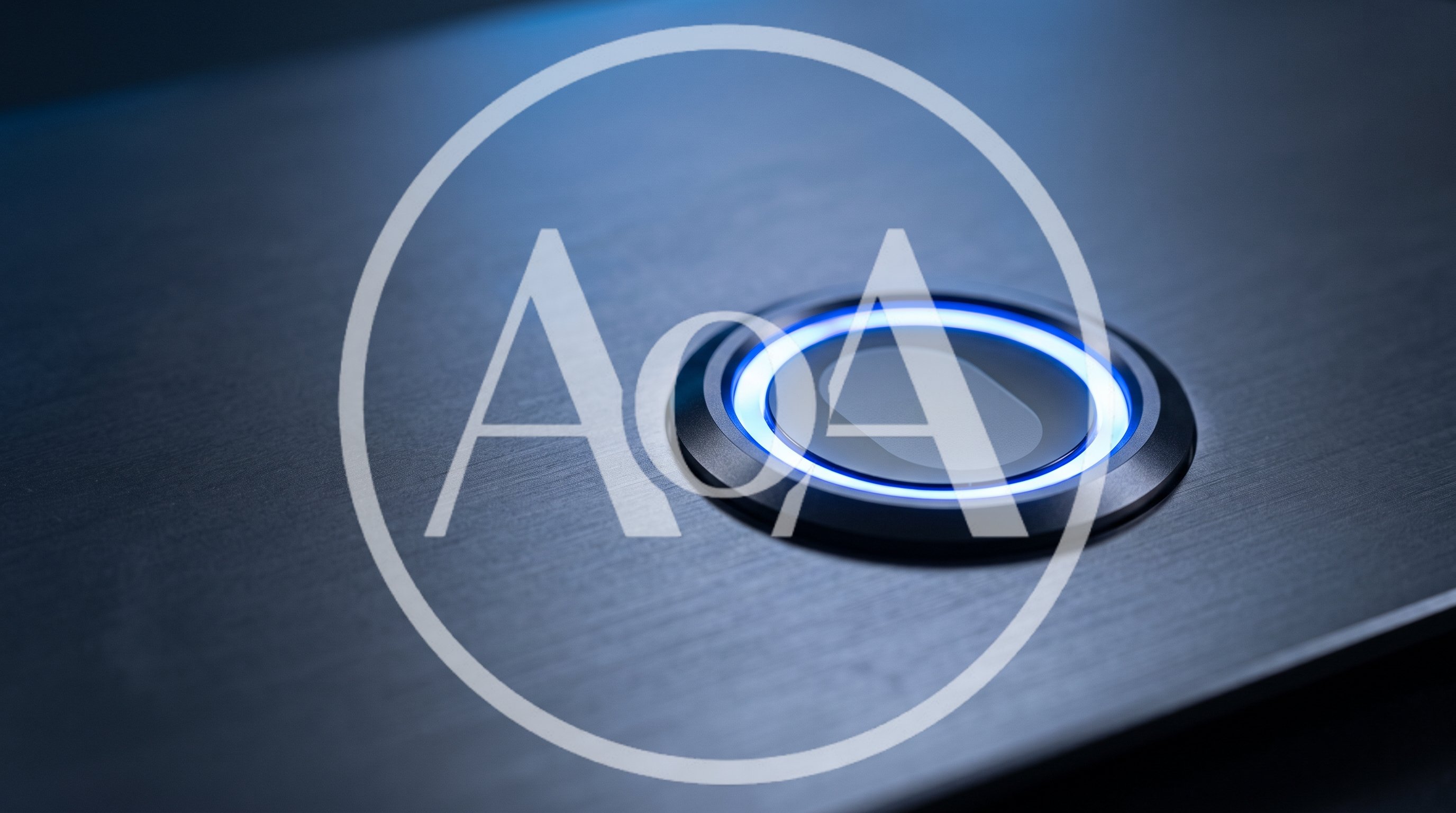 Illuminated Power Button On Brushed Metal Surface