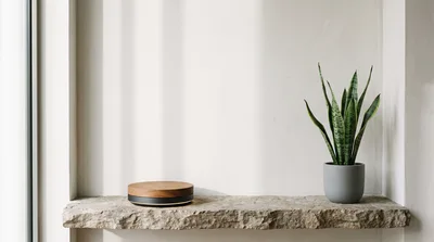 Minimalist Wooden Display Stand on Stone Shelf