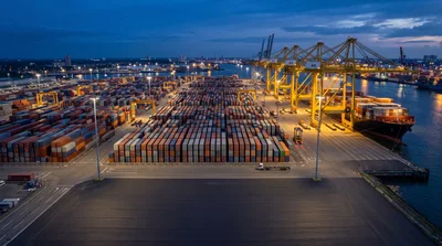 Aerial View Of A Busy Container Port At Twilight