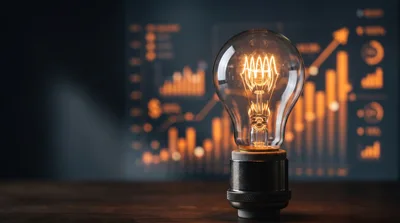 Glowing Light Bulb Against Financial Data Charts
