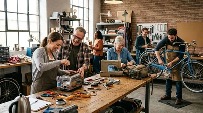 Diverse Group Repairing Household Items in Community Workshop