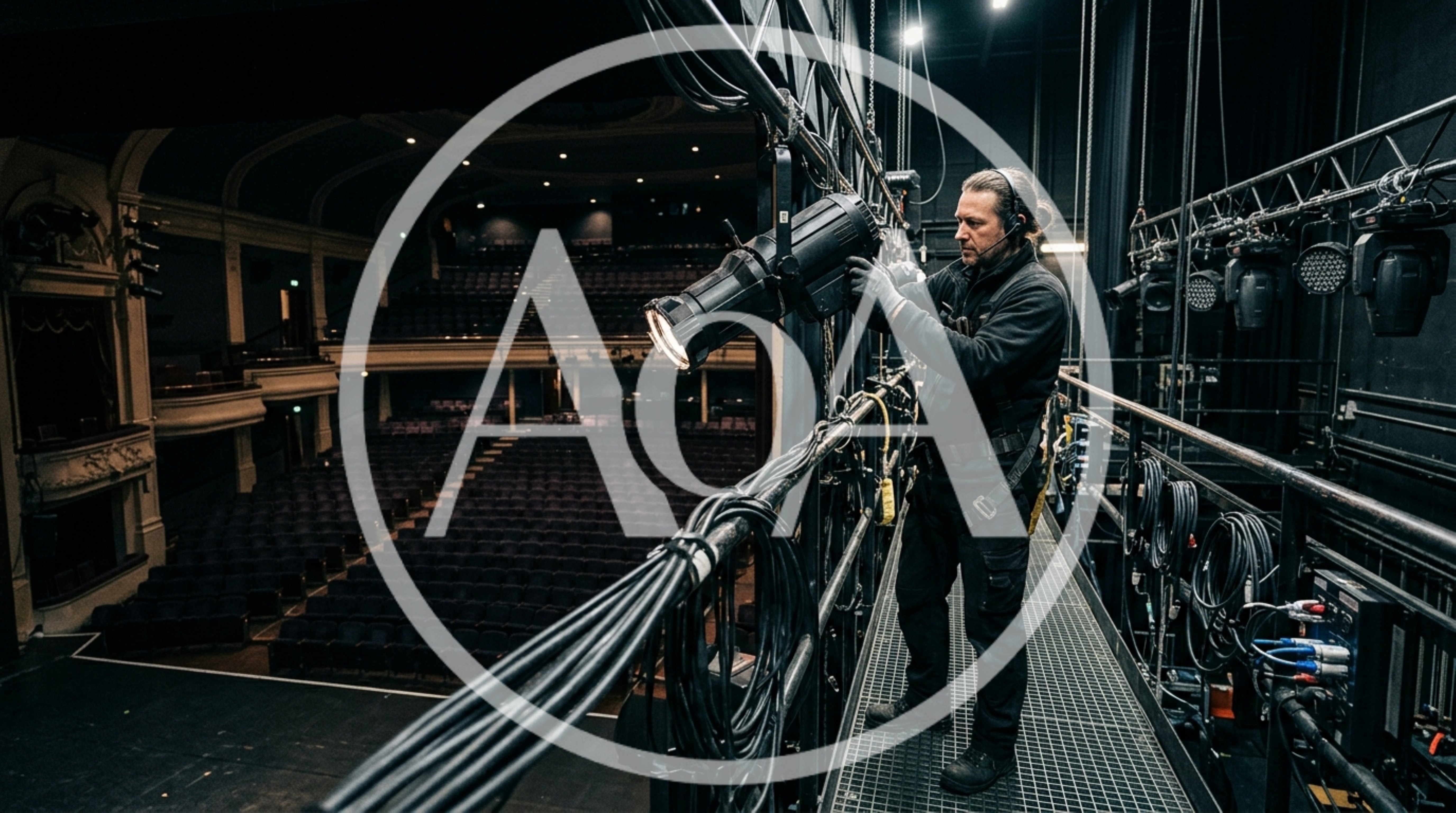 Theater Technician Adjusting Stage Lighting Equipment