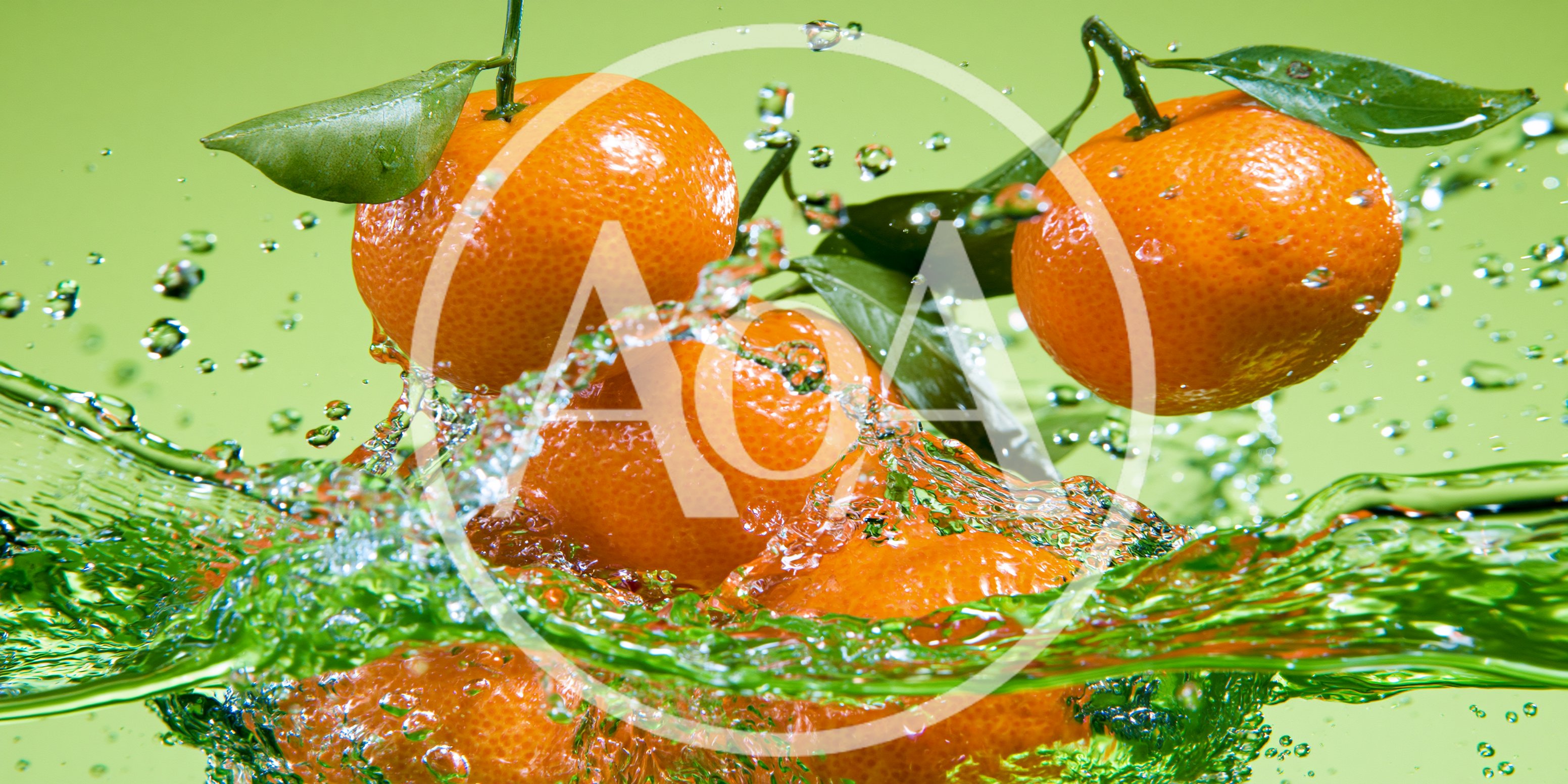 Fresh Tangerines Splashing Into Water
