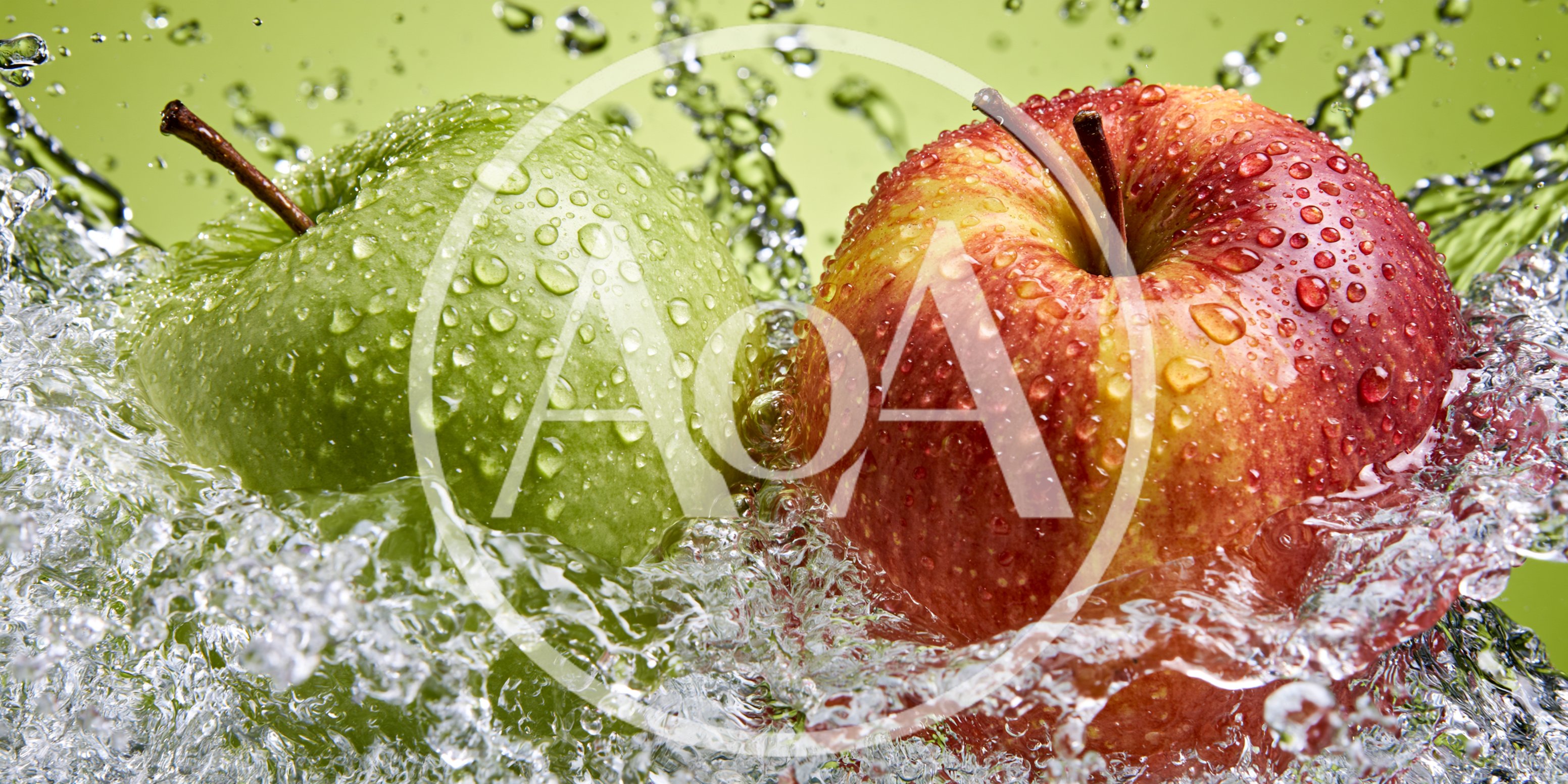 Green and Red Apples Splashing in Water